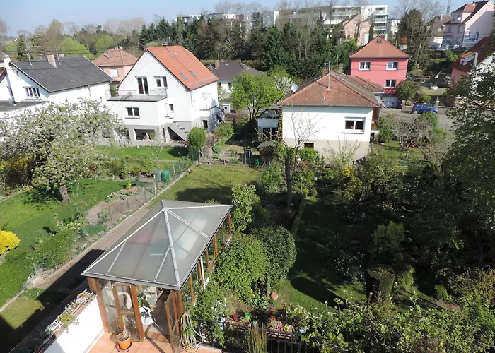 Au-dessus Du Jardin Climatise